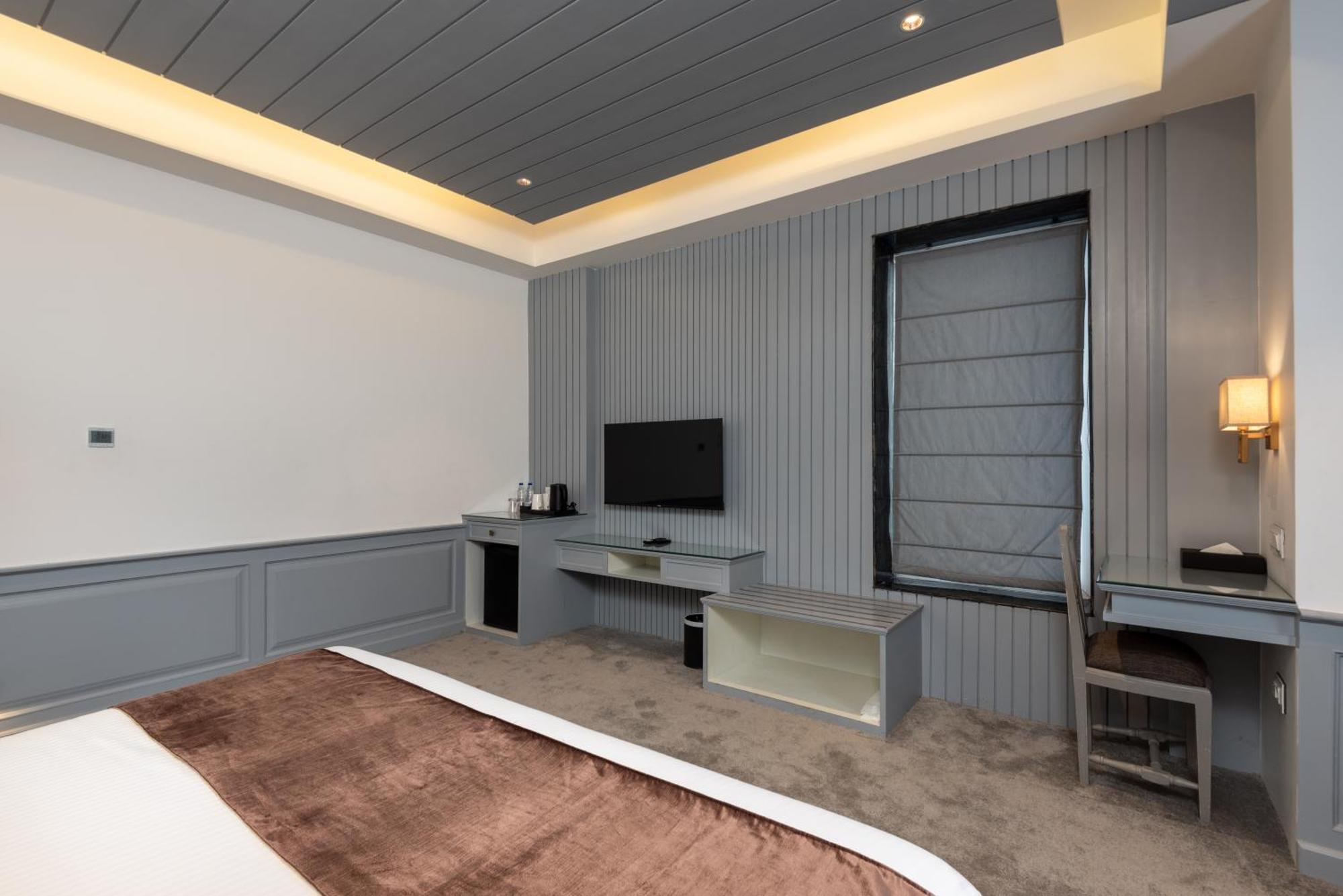 Hotel Grand Boulevard Durgjan Szoba fotó